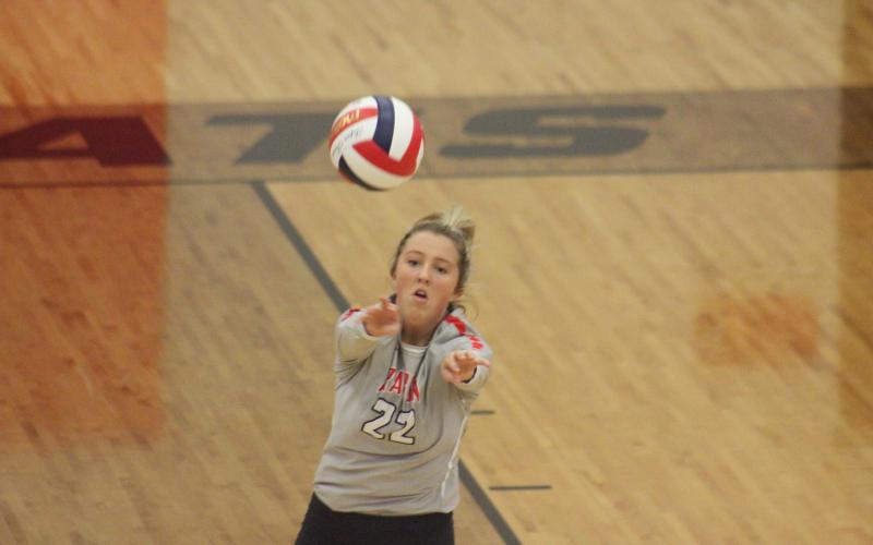 Rabun County’s Lexi Crump digs at the ball during a match against Dade County in the quarterfinal round of the GHSA Class A/AA-Public state playoffs at Ken Byrd Court in Tiger last Saturday afternoon. (Glendon Poe/The Clayton Tribune)