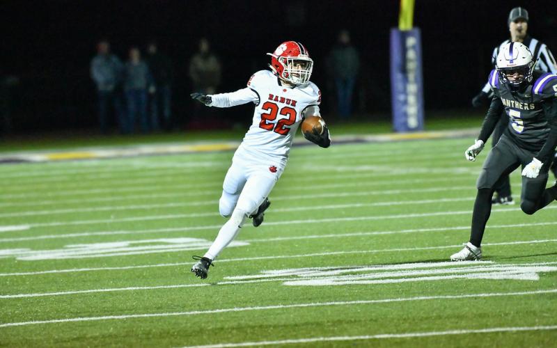 Scott Poss/Special to The Clayton Tribune. Sophomore Hunter Moore carries the ball against Union County last Friday night in the Wildcat victory.