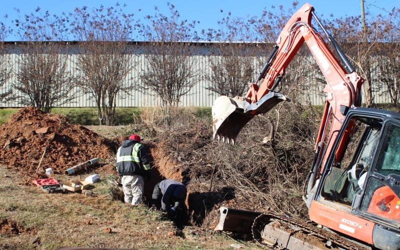 Megan Broome/The Clayton Tribune. A leak in the culvert at the intersection of the Food Bank of Northeast Georgia and Chechero Street last week caused contents to pour into Stekoa Creek.
