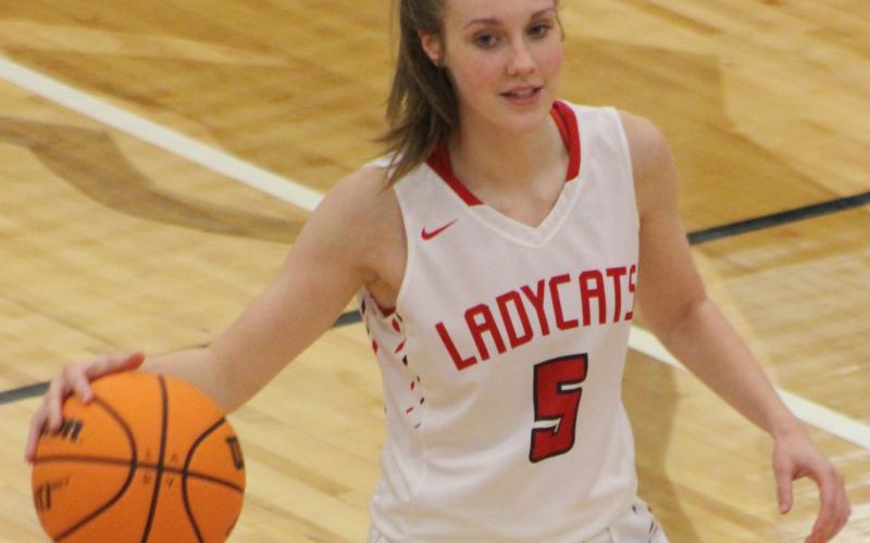 (Andy Diffenderfer/The Clayton Tribune) Loren Stiles canned two threes Tuesday and scored eight points in the Ladycats' Region 8-AA win over Elbert County.