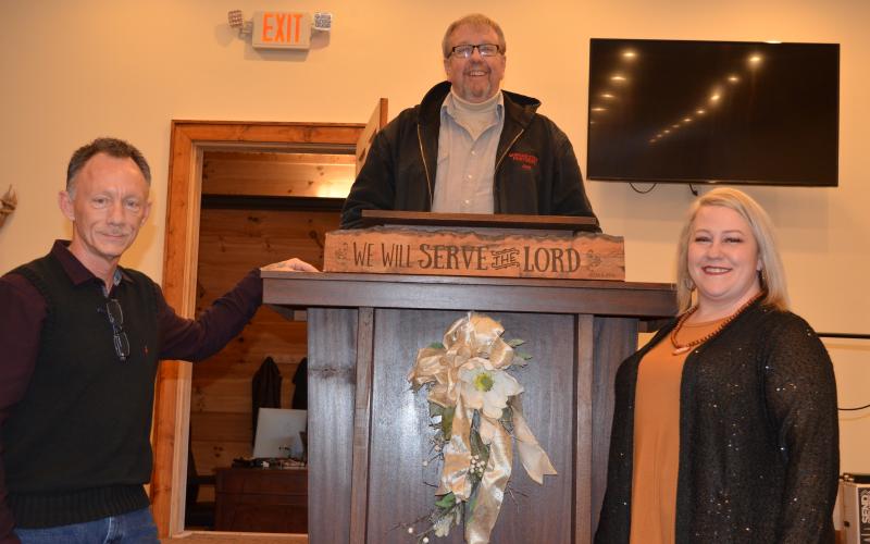 Wayne Knuckles/The Clayton Tribune. Freedom Ministries Lighthouse staff members, from left, are Dan Crane, Joel Winchester and Ashley York.