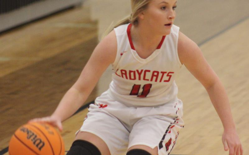 Andy Diffenderfer/The Clayton Tribune Ali Ramey tries to find an open teammate in Rabun County’s win over Putnam County.