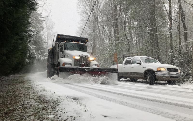 Daniela Cintron/For The Clayton Tribune Road crews were kept busy during Saturday’s snowstorm, which shut down traffic for a time.