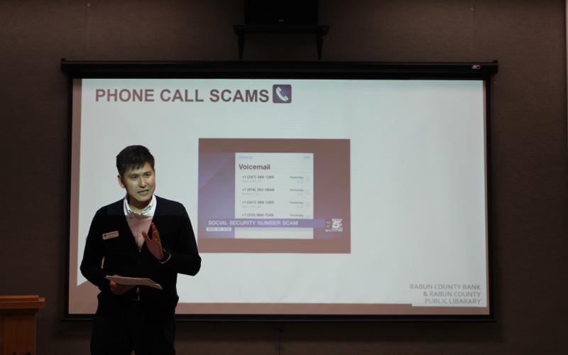 Yong Kim, executive vice president and CFO of Rabun County Bank, speaks to a group at a lunch and learn sponsored by Rabun County Bank about how to spot fraud and prevent being scammed on Tuesday, Jan. 28 at the Rabun County Library.