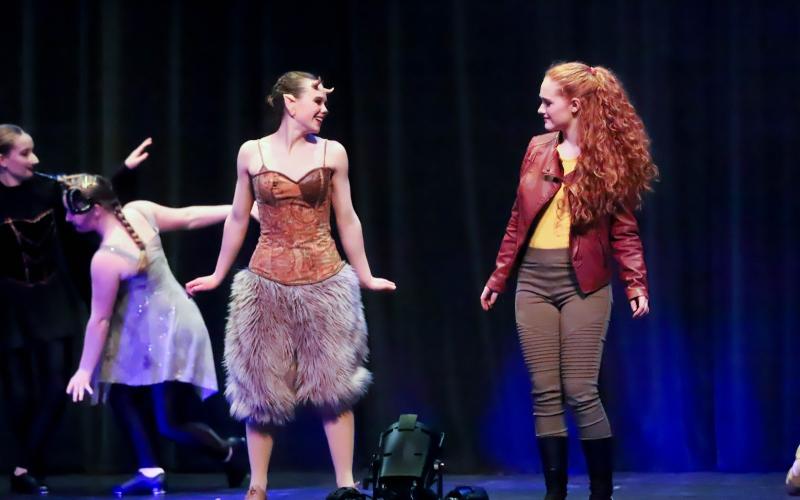 Sarah Katherine Brenner as The Strange Kreature and Cydni Coppage as The Girl, perform in Cirque Arqadia.