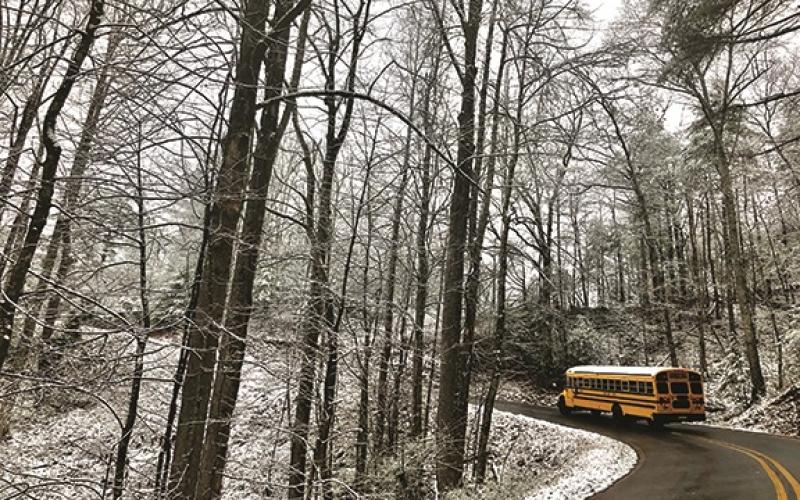 Daniela Cintron/The Clayton Tribune. A Rabun County school bus ferries students home following the early dismissal.