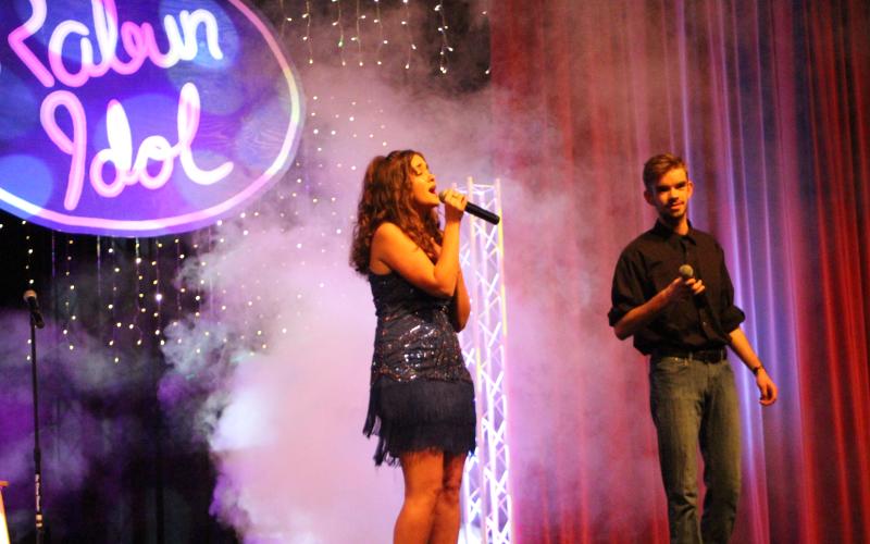 Megan Broome/The Clayton Tribune. Taylor Erlewine, left, and Garrison Matlock sing a duet of the song “Don’t Go Breaking My Heart."