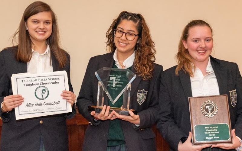 Submitted photo From varsity cheerleading are junior Allie Kate Campbell of Cleveland, Toughest Cheerleader Award; senior Alycia Morales of Ridgewood, N.Y., Coach’s Award; junior Morgan Webb of Demorest, Most Improved Award.