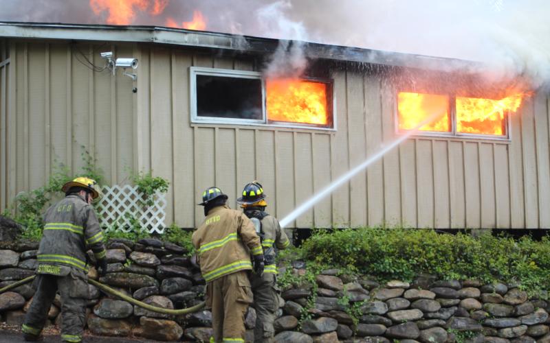 Megan Broome/The Clayton Tribune. Rabun County Fire Services assisted Otto Fire and Rescue with a commercial structure fire at 371 Andy’s Trout Farm Rd. on Thursday, May 7.