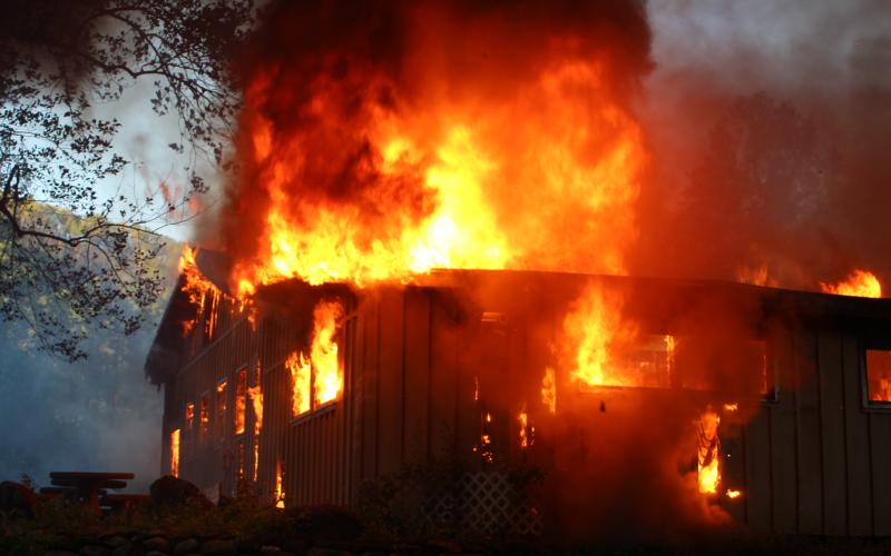 Megan Broome/The Clayton Tribune. Rabun County Fire Services assisted Otto Fire and Rescue with a commercial structure fire at 371 Andy’s Trout Farm Rd. on Thursday, May 7.