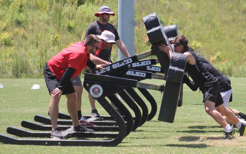 Andy Diffenderfer/The Clayton Tribune. Football workouts at Rabun County High have been divided into two groups, one starting in the morning and the other later in the day.