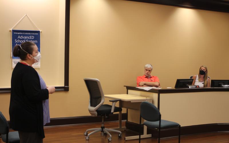 Megan Broome/The Clayton Tribune. Roxie Forrester, parent of a Rabun County Schools student, addresses Board of Education board members at their meeting last Thursday to inquire about school opening procedures and the safety measures that will be put in place to protect against the spread of COVID-19.