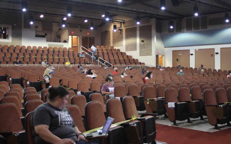 Megan Broome/The Clayton Tribune. Faculty and staff members of Rabun County Schools social distance in the school’s Fine Arts Building last Friday to attend a technology training seminar in preparation for the upcoming school year.