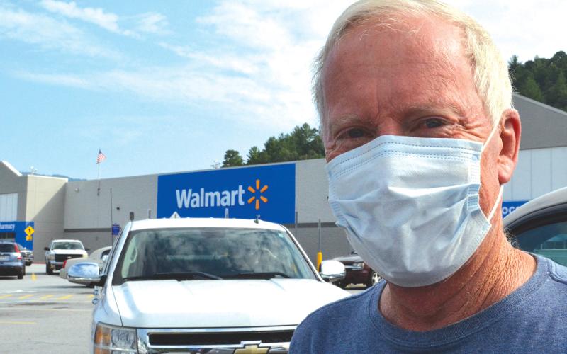Wayne Knuckles/The Clayton Tribune. "I always wear a mask," said Keith Knudson as he prepared to shop at the Clayton Walmart Tuesday.