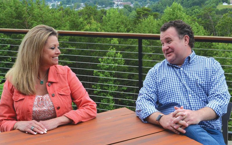 Wayne Knuckles/The Clayton Tribune. Mountain Lakes Medical Center CEO Tammy Coll (left) chats with Matthew Lemak of Merem Health last Friday.