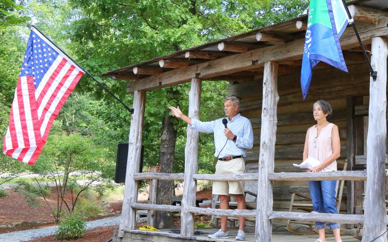 Photo courtesy Leif Erickson. Lake Burton Civic Association President Chip Groome and Linda Goen speak at Saturday's event.