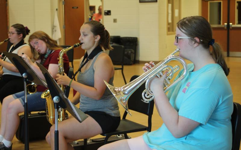 Megan Page, left, Skylar Krockum, Mallory York and Grace Dyer practice during woodwind sectionals in the Rabun County High School band room at band camp.