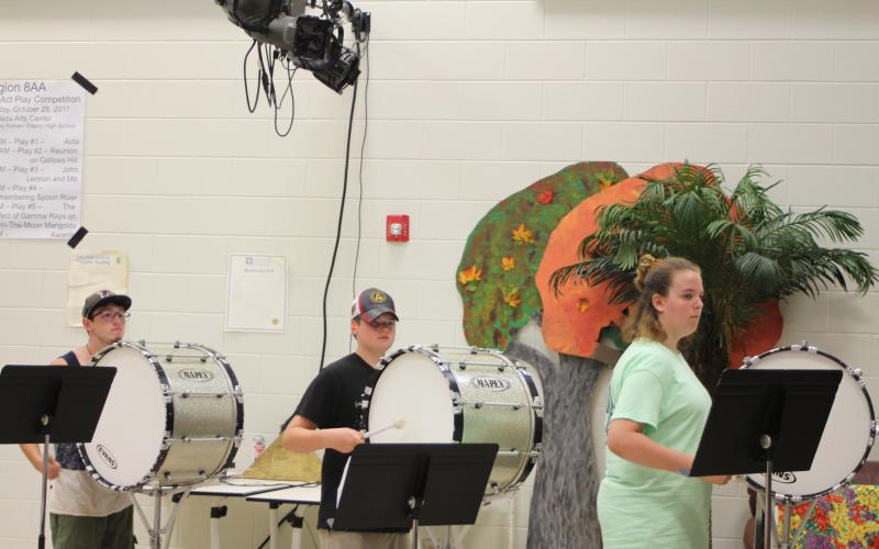 Gavin Nubern, left, Brady Mazarky and Kaylee Smith practice during percussion sectionals in the Rabun County High School band room at band camp.