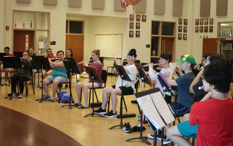 Amy Henderson, left, Ivy Duttenhoffer, Cheyenne Bradshaw, Jazmin Forrester, Audrey Schomberg, McKenzie Hamilton, Elena Ellis and Asia Tran-Cao practice during woodwind sectionals in the Rabun County High School band room at band camp.