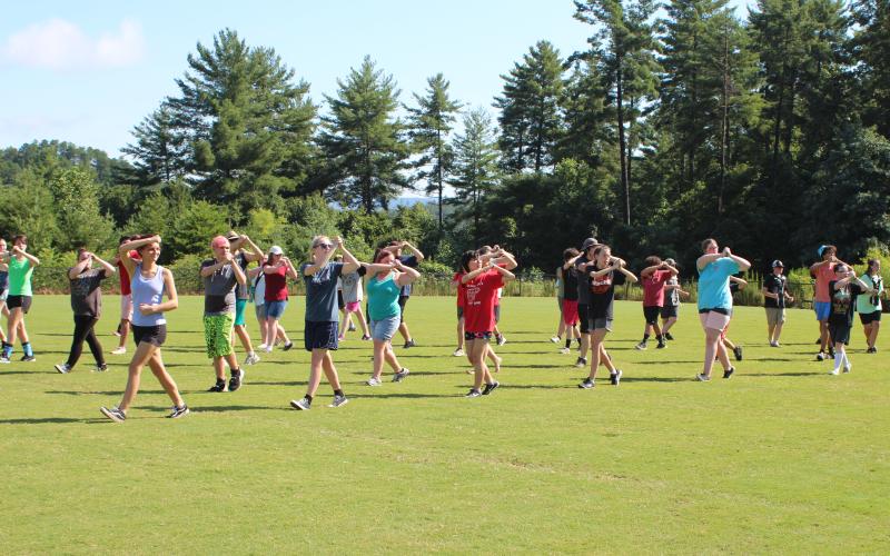Tiffani Dobson, left, McKenzie Hamilton, Asia Tran-Cao, Katie Shields, Grace Dyer and Janie Henslee work on marching fundamentals.