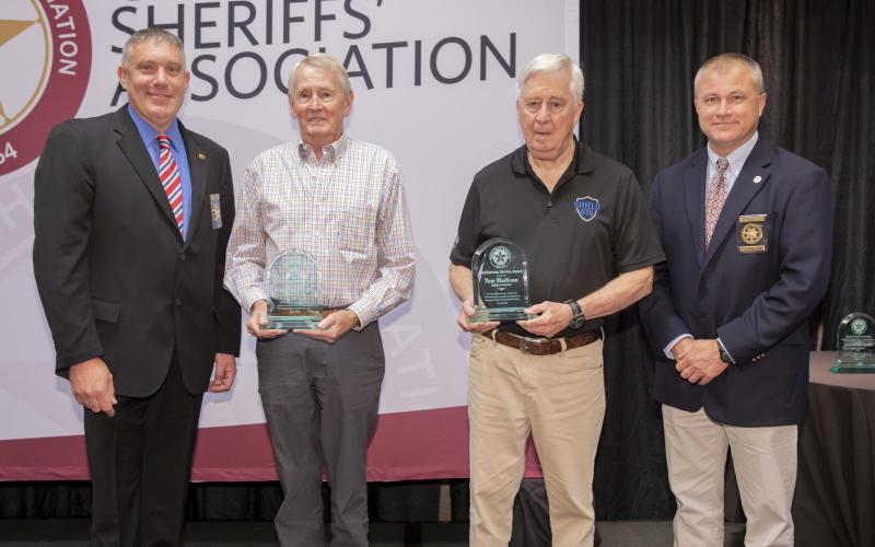 Photo courtesy Rabun County Sheriff's Office. Rabun residents Stephen Wright and Tom Madison were presented with the Meritorious Award at the Georgia Sheriffs’ Association Summer Conference at Lake Lanier recently. Above, from left: Rabun County Sheriff Chad Nichols, left, Stephen Wright, Tom Madison, and Georgia Sheriffs’ Association President and Lumpkin County Sheriff Stacy Jarrard.