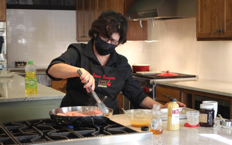 Megan Broome/The Clayton Tribune. Joanne Baumgartmner loves to prepare comfort food.
