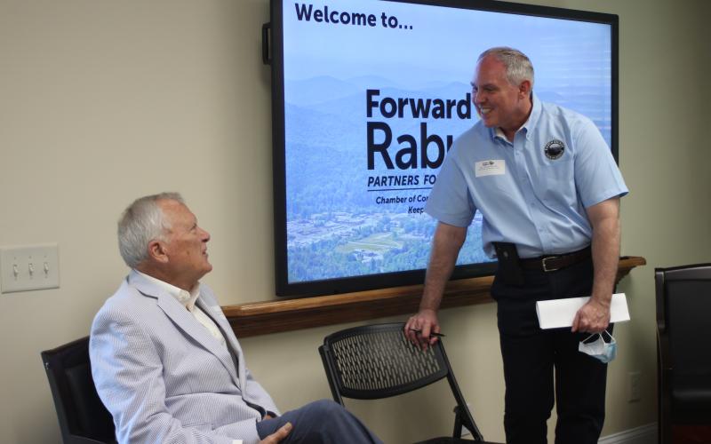 Megan Broome/The Clayton Tribune. Former Gov. Nathan Deal (left) is greeted by Forward Rabun Director Rick Story Tuesday at the organization's inaugural board meeting. Story previously worked for Deal during his time as Georgia governor.