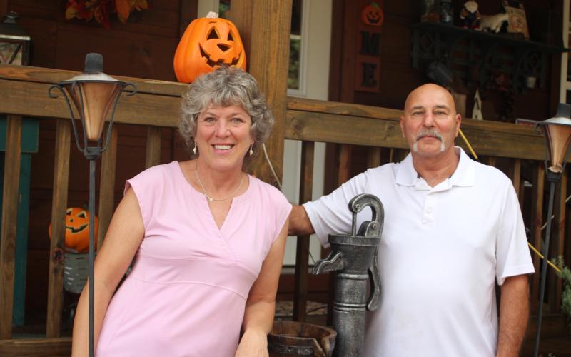 Megan Broome/The Clayton Tribune. Julie Delucia is a breast cancer survivor and strives to live life every day to the fullest. She said that her husband of 34 years, Al, has been a huge part of her support system through her breast cancer diagnosis and treatment journey.