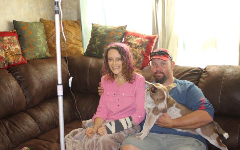 Megan Broome/The Clayton Tribune. Fran Webb said her husband Charlie, right, along with friends and family are her rock support system as she battles breast cancer.