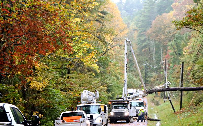 Photo courtesy Liza Broz. Georgia Power works at an address on Old 441 by the Short Line last Saturday to restore power and clear the roadway after heavy storms from Hurricane Delta knocked over trees onto power lines.