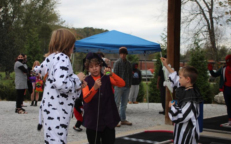Megan Broome/The Clayton Tribune. Kids and their families had a blast at the Fall jamboree in Clayton on Halloween night.
