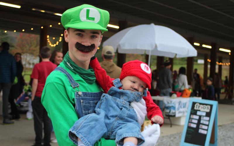 Megan Broome/The Clayton Tribune. Kids and their families had a blast at the Fall jamboree in Clayton on Halloween night.