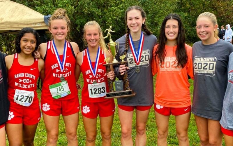 Submitted photo The Rabun County High School girls cross-country team won the Region 8-AA championship last week. Molly Jo Wright won individual honors, while teammates Lucy Hood and Christina Gergeni finished third and fifth.