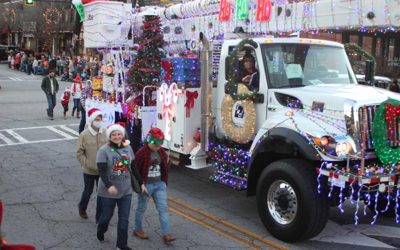Megan Broome/The Clayton Tribune. Habersham Electric Membership Corporation (EMC) was the first place winner in the Christmas parade judging contest with the theme “powering the holidays.”