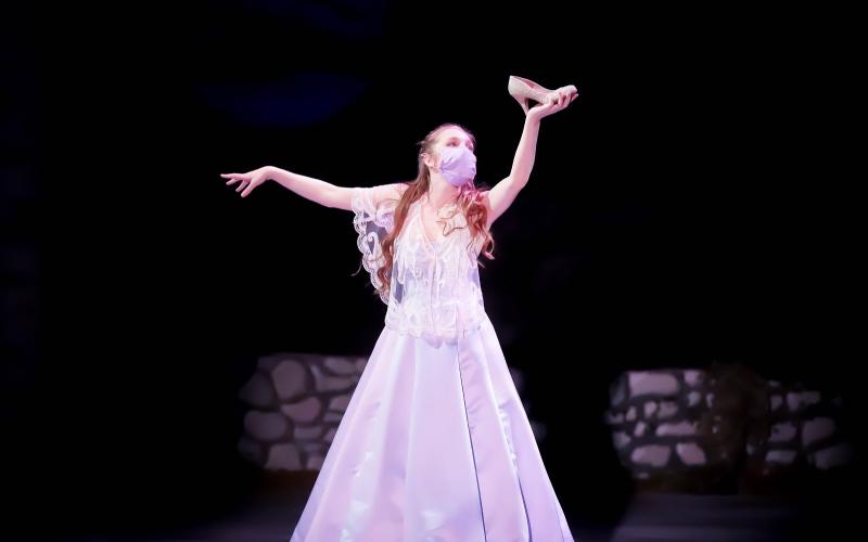 Photo courtesy Rabun Gap-Nacoochee School. Cinderella, played by Emma Jean Scott ‘21 of Clayton, GA, lifts up her shoe during Rabun Gap-Nacoochee School’s performance of “Into the Woods.”