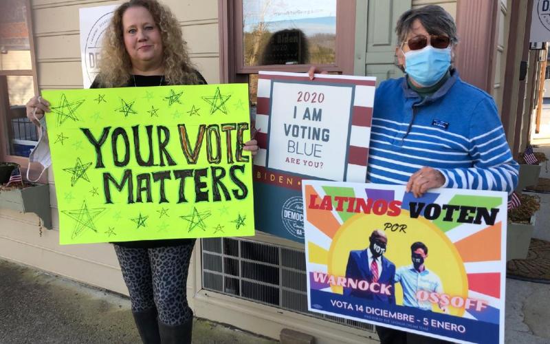 Submitted photo. Rabun County Democrats Miranda Compton, left, and Dee Daley in the closing days of campaigning.