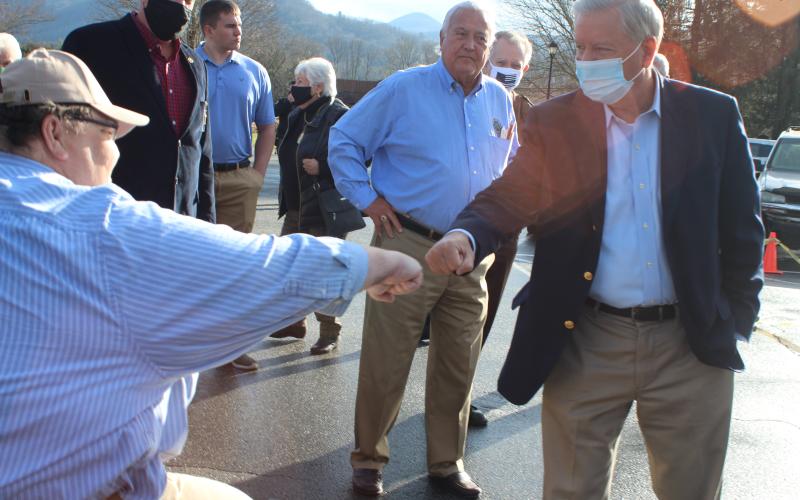 Megan Broome/The Clayton Tribune. Rabun County GOP Secretary Ed Henderson receives a fist bump from South Carolina Senator Lindsey Graham last week at a campaign rally held at The Dillard House.