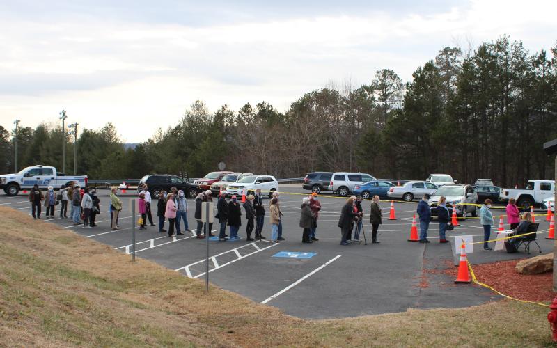 Megan Broome/The Clayton Tribune. Patients stand in line to check-in for their appointment to receive their COVID-19 vaccination on Tuesday. Over 700 vaccinations were given at the clinic held at the Rabun County Recreation Department.