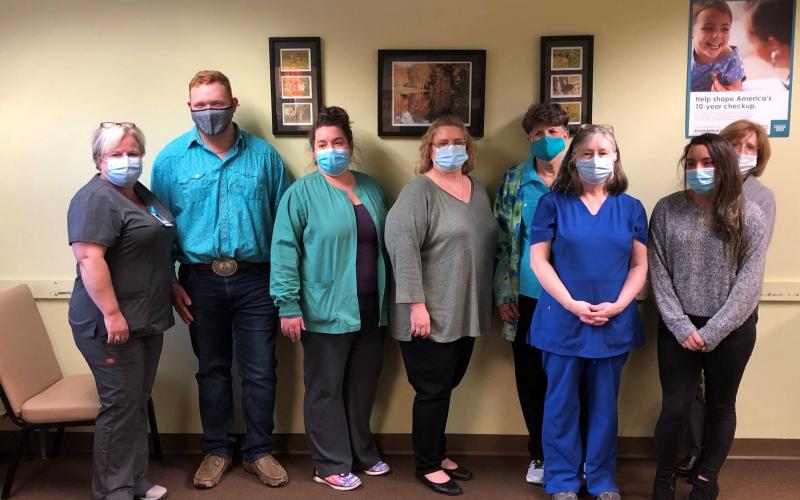 Photo courtesy Rabun County 4-H Club. Rabun County 4-H President Carson Carpenter with members of the Rabun County Health Department.