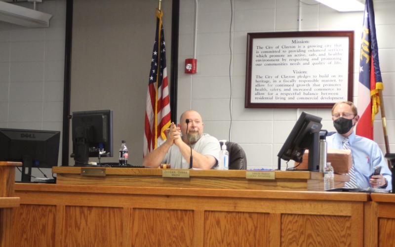 Megan Broome/The Clayton Tribune. Clayton Council Member David Cross, left, serves as Mayor Pro Tempore at Tuesday’s council meeting in Mayor Jordan Green’s absence.