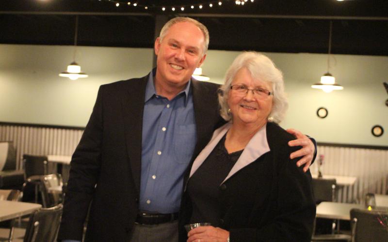 Megan Broome/The Clayton Tribune. Rick Story, director of development for Rabun County, left, and Juanita Shope attend a reception honoring Shope last Thursday at The Diner below the Rabun County Civic Center. Shope recently stepped down as president and community liaison of the Rabun County Chamber of Commerce.