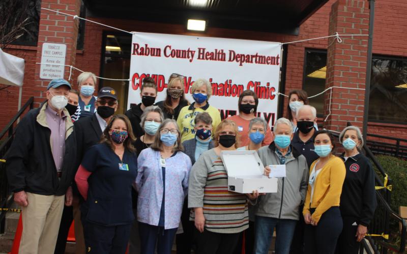 Lisa Overholt, LPN, front left, Josie Moseley, LPN, Kay Lopez, clerk, Ray Pagano, Rotarian, Summer Bruce, clerk, Kay Vinson, volunteer.  Connee Martin, RN, middle left, Karen Blair, volunteer, Debbie McKinney, volunteer, and Jef Fincher, Rotary president-elect.  Matt Mitcham, Rotary secretary, back left, Tony Penrose, Rotarian, Dulene Jones, Rabun County Health Department County Nurse Manager, Ana Fields, E-911, Julie Phelan, RN, Jane Janes, Rotarian, Hailey Henson, E-911, and Renee Padgett, cler.supervisor