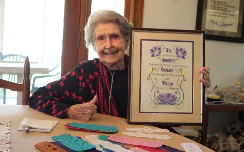 Megan Broome/The Clayton Tribune. Mildred Widgery plans to make 100 bookmarks to distribute in honor of her 100th birthday.