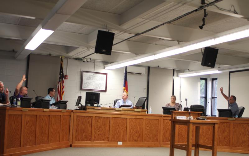 Megan Broome/The Clayton Tribune. Clayton council members vote to make a counter-offer to the county after a closed session following a special called meeting on Tuesday.