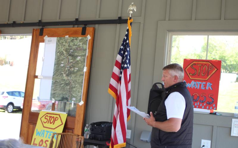 Megan Broome/The Clayton Tribune. Darrin Giles, county administrator, speaks to citizens about the county’s stance on the city’s recent counter-offer to sell their water and sewer system, at a forum hosted by the Rabun County Coalition for Good Government on Monday.