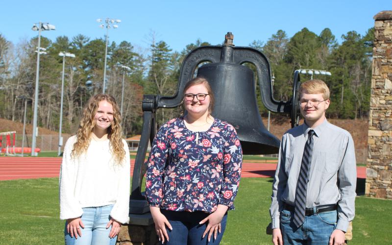 Megan Broome, The Clayton Tribune. Lauren Barnes, left, Alexis Martin and Chaner Hensley are the Class of 2021 Valedictorian, Salutatorian and Historian, respectively.