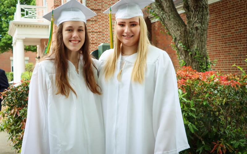 Photo courtesy Rabun Gap-Nacoochee School. Julia Sadlon, left, of Franklin, N.C. and Alleson Queen, of Clayton, pose for a picture before graduation at Rabun Gap-Nacoochee School.