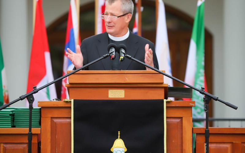 Photo courtesy Rabun Gap-Nacoochee School. The Rev. Robert W. Prim, pastor of Nacoochee Presbyterian Church, addresses Rabun Gao-Nacoochee School graduates as baccalaureate speaker.