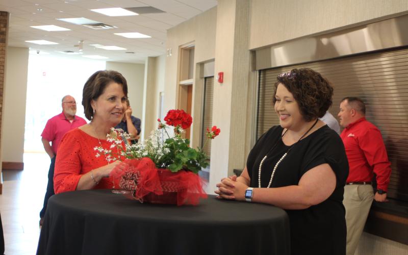 Megan Broome/The Clayton Tribune. Cindi Dean, director of business operations and human resources, left, and Amy Pruitt, federal programs director, attend the 2020-2021 retired employee reception held at RCHS last Thursday.
