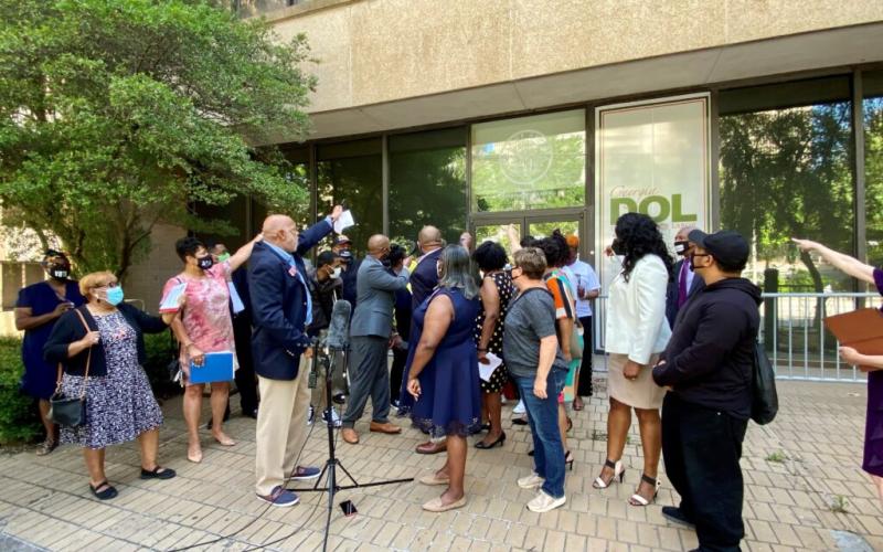 Beau Evans/Capitol Beat News Service. State lawmakers and labor advocates protest last month outside the Georgia Department of Labor office in Atlanta.